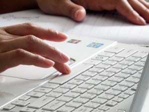 finger-pressing-computer-keyboard